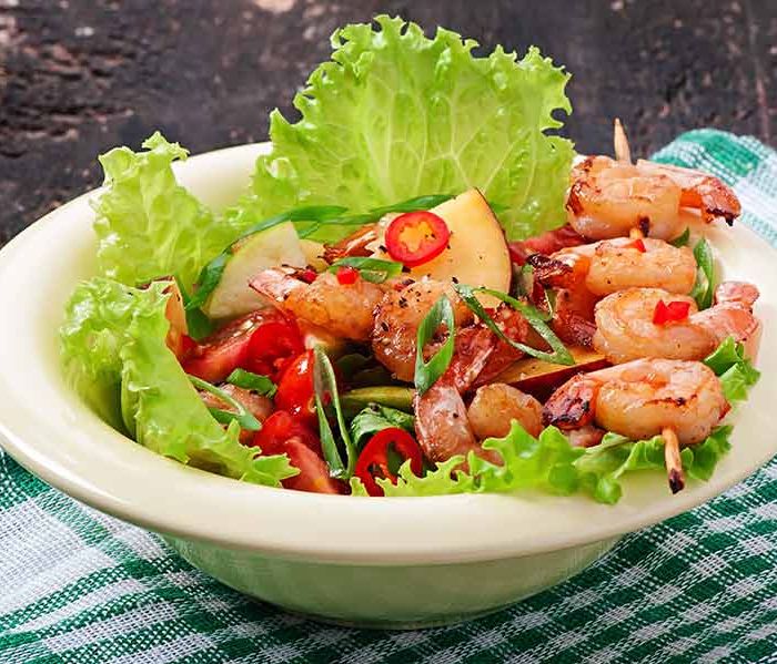 Shrimp salad with peaches and avocado