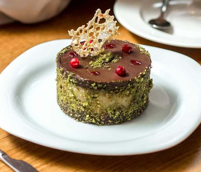 Chocolate cheesecake with kataifi and pistachio paste
