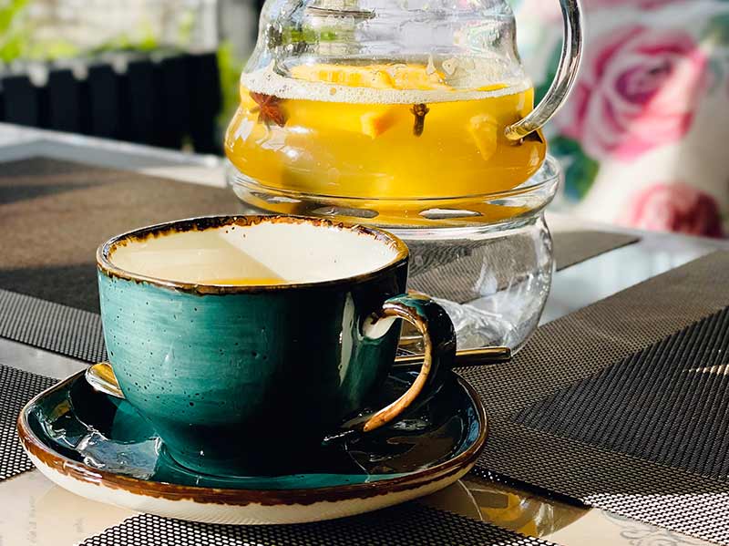 Sea buckthorn herbal tea with fresh leaves