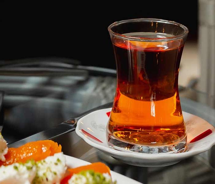 Aromatic black tea in a glass cup