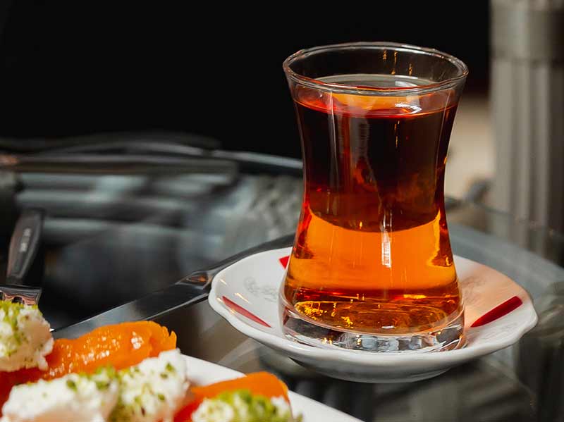 Aromatic black tea in a glass cup